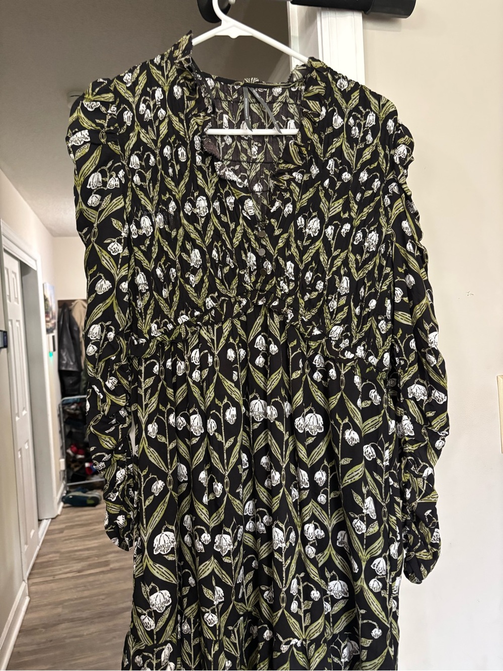 Anthropologie Black Tunic with Olive Green Leaf & White Floral Print